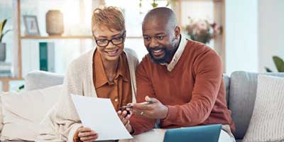 Couple looking at money market account