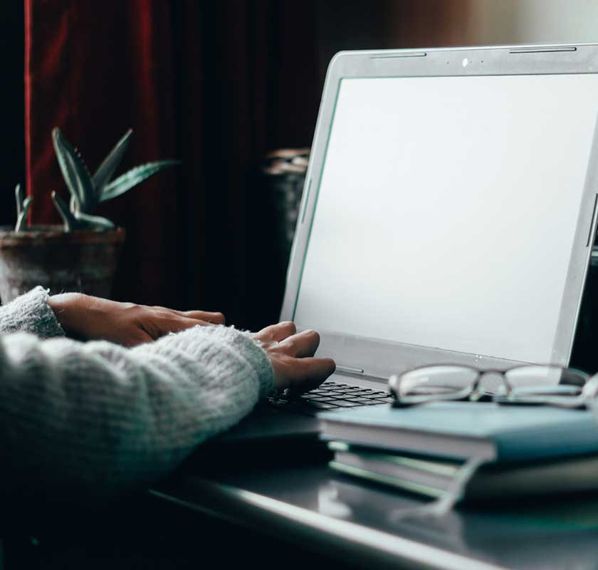 Person at home on laptop